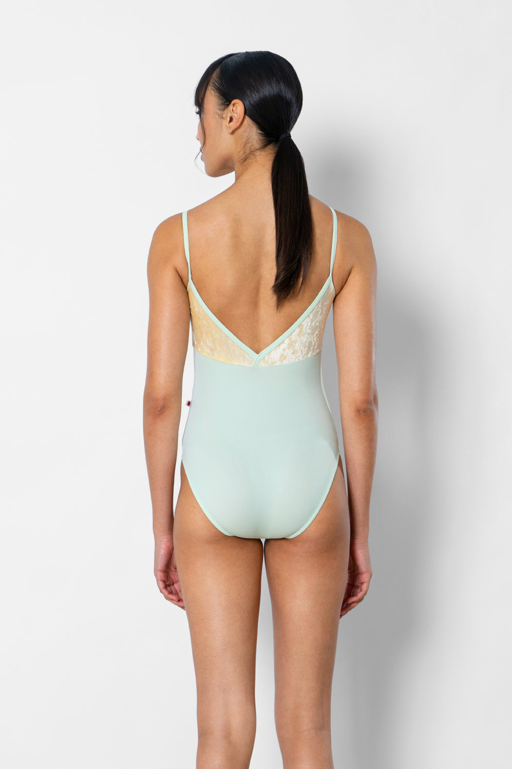 Daria leotard in T-Pistachio body color with CV-Vanilla top color and T-Pistachio trim color