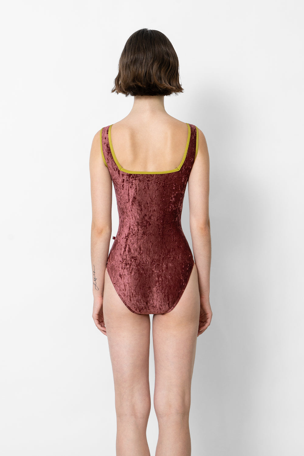 Marieke leotard in CV-Garnet body color with N-Cricket trim color