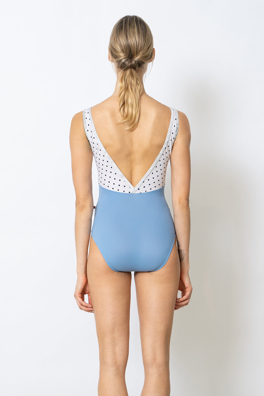 Alicia leotard in T-Bluebell body color with T-Polka Dot top color and CV-Silver trim color