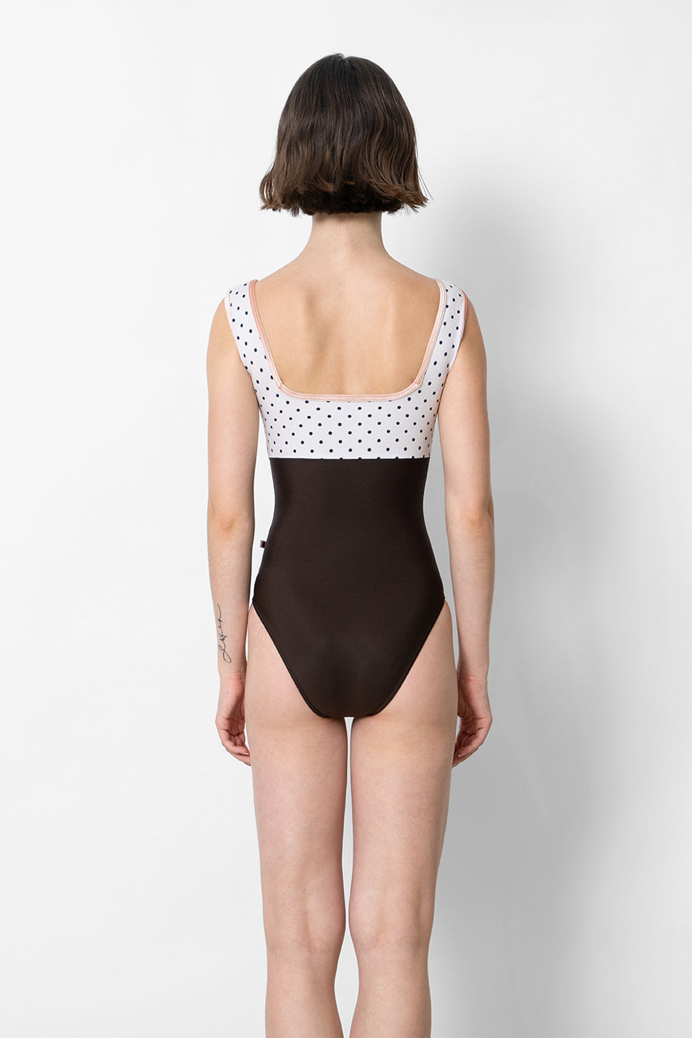 Marieke Duo leotard in N-Espresso body color with T-Polka Dot top color and V-Blush trim color