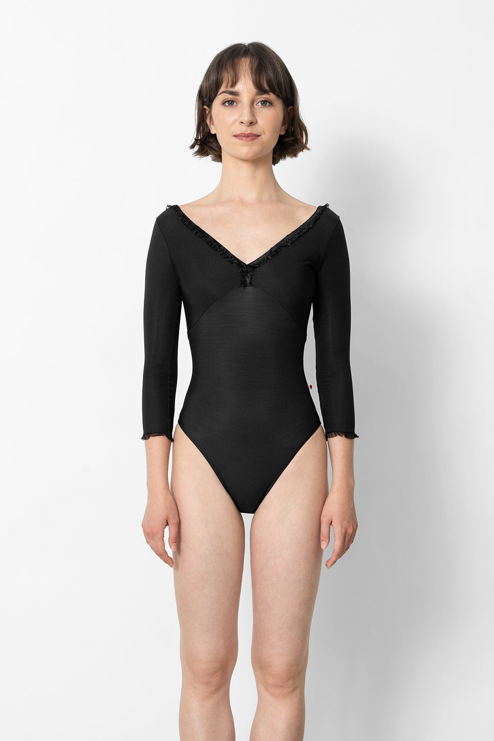 Alicia leotard in N-Black body & top color with CV-Black trim color, 3Q sleeves and Black Ruffle