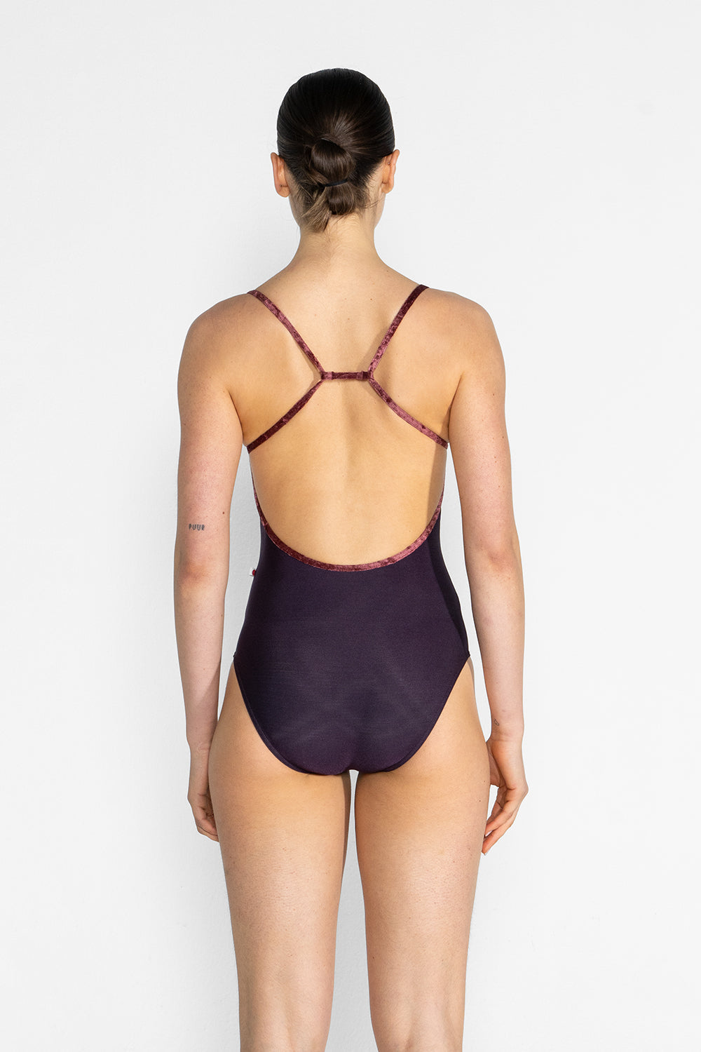 Nadja leotard in N-Eggplant body color with CV-Garnet trim color