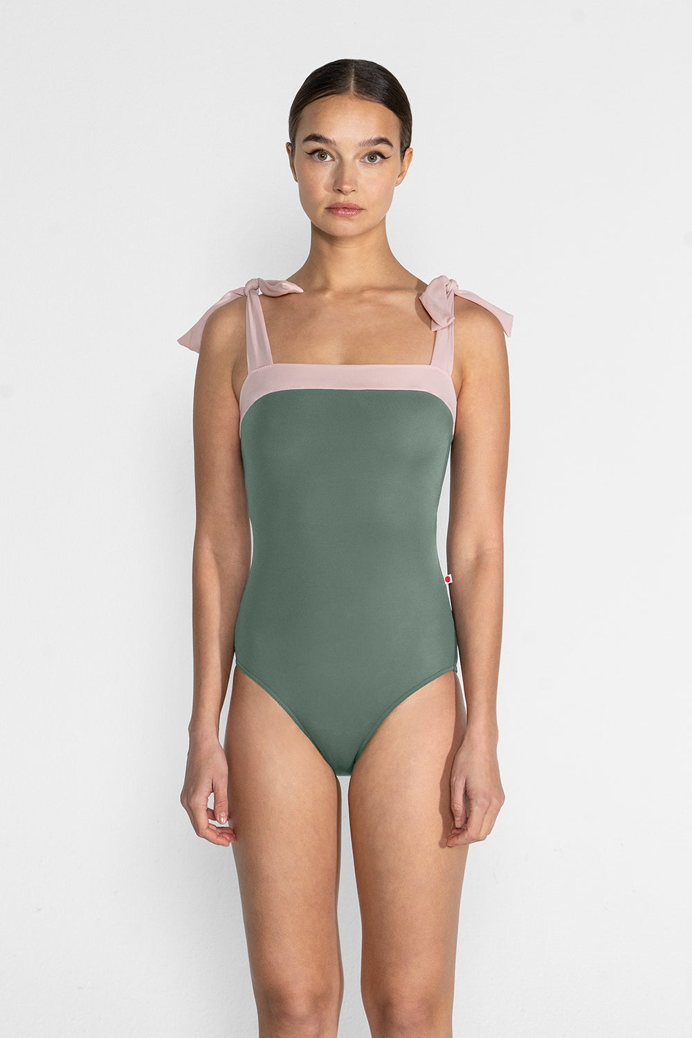 Mimi leotard in T-Sage body color with T-Petal top color